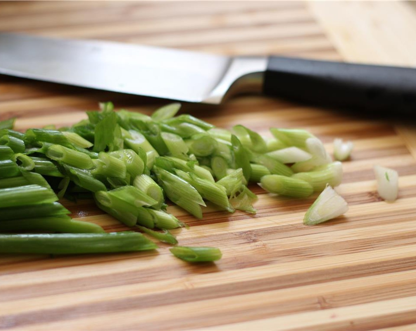 step 10 Meanwhile, chop the Scallion (1 bunch) into 1/4 inch pieces on the diagonal.