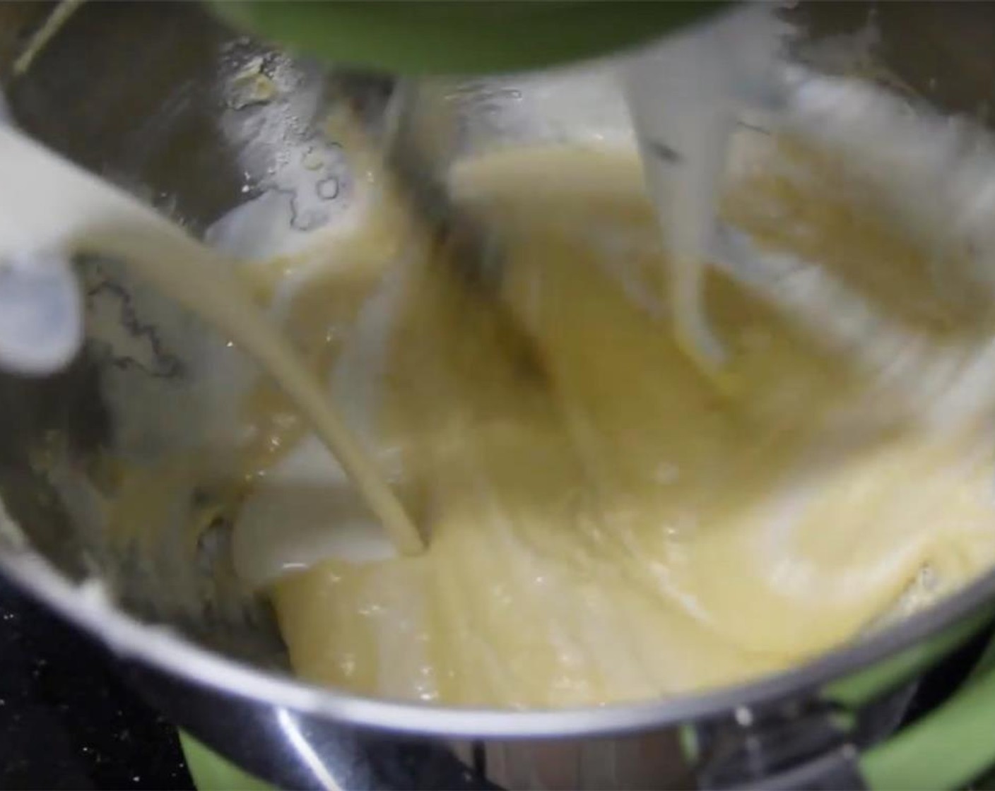 step 12 Then, pour in all of your milk mixture. Lastly, add the rest of your dry ingredients in, a spoonful at a time.