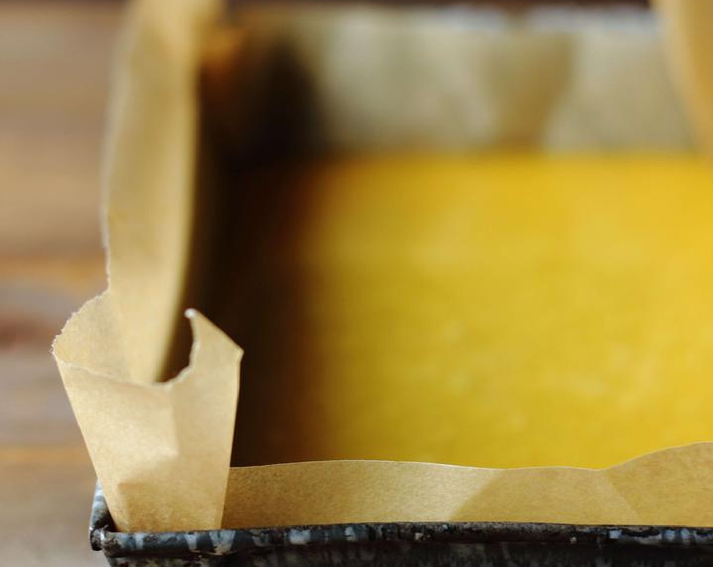 step 6 Pour the mixture into a medium sized dish lined with parchment paper.