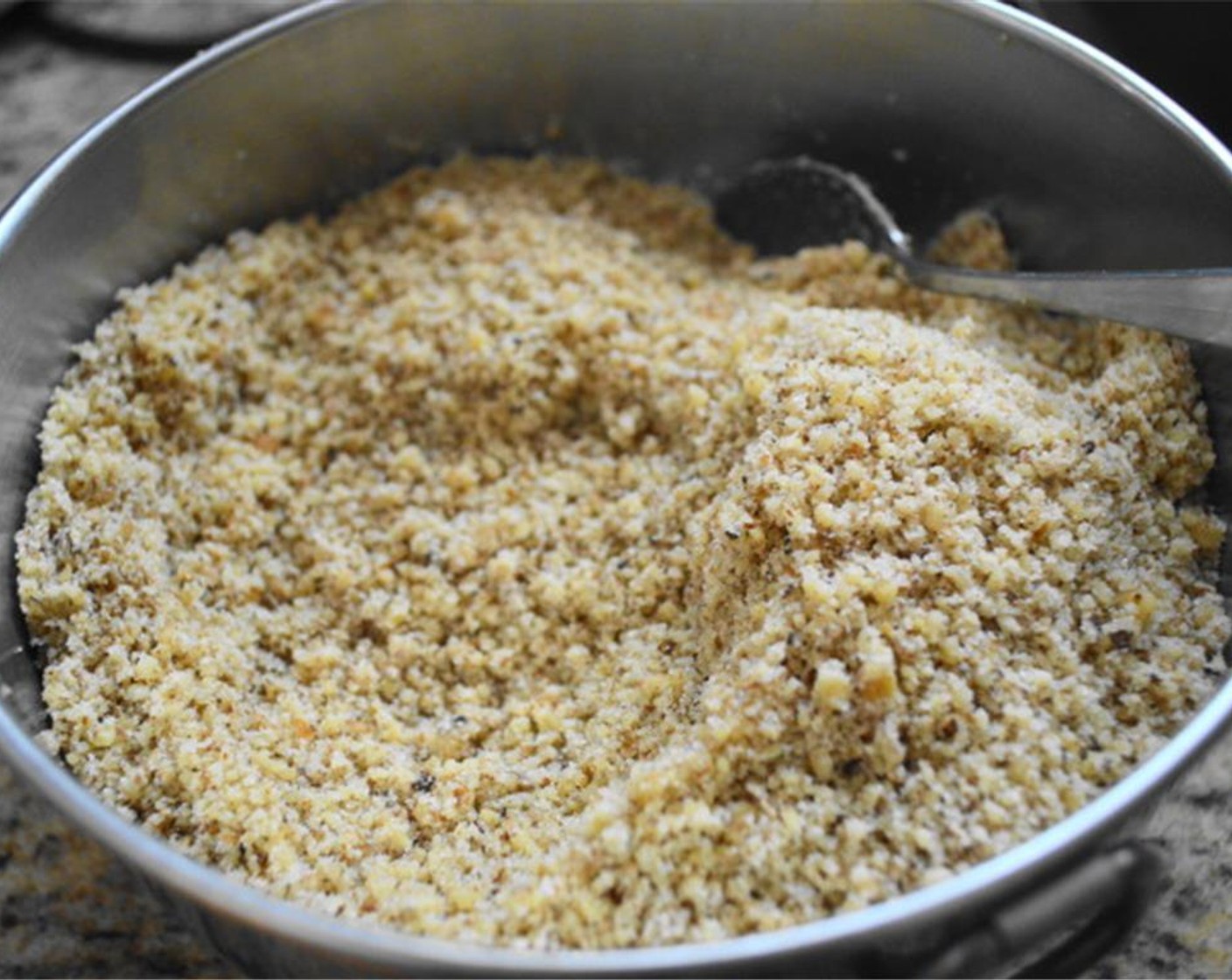 step 2 To prepare the walnut filling, use a food processor to grind the Walnuts (3 2/3 cups) finely but still keeping some texture. Stir the ground Walnuts, Granulated Sugar (1/3 cup), and Ground Cinnamon (1 tsp) together in a mixing bowl. Set it aside.