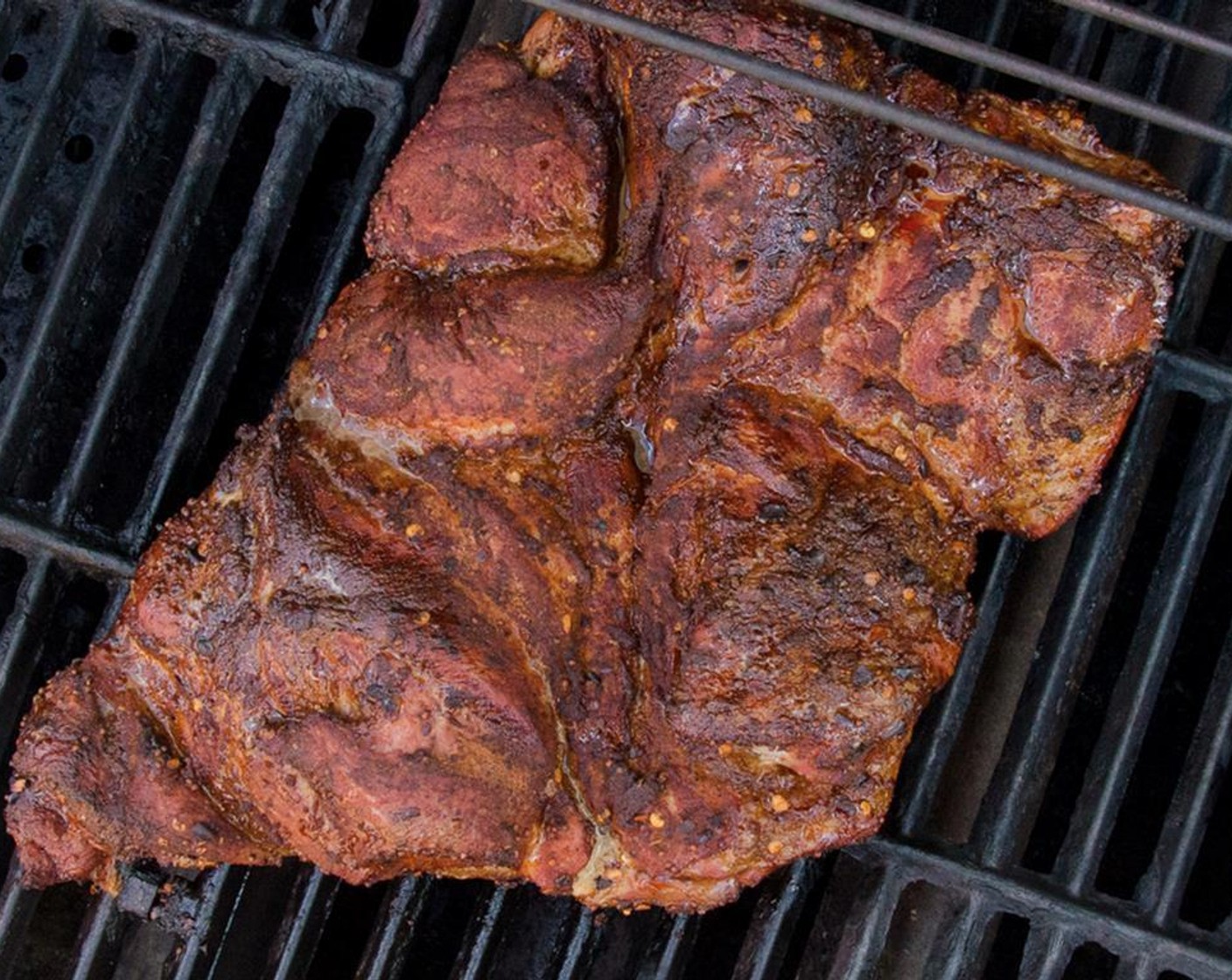 step 10 After an hour, use the meat thermometer to check the temperature of the meat by inserting it into the thickest portion. When it reaches 125 degrees F (51 degrees C), turn the rest of the burners on and use direct heat for the remainder of the cooking.