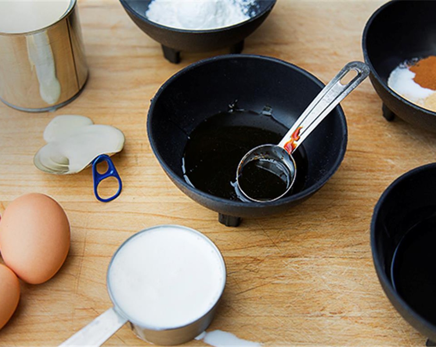 step 10 Add the Sweetened Condensed Milk (1 1/3 cups), Whipping Cream (1/2 cup), Corn Starch (2 Tbsp), Molasses (2 Tbsp), Vegetable Oil (2 Tbsp), Ground Cinnamon (1 Tbsp), Ground Ginger (1 tsp), Salt (1/4 tsp), and Farmhouse Eggs® Large Brown Eggs (3) and mix thoroughly.