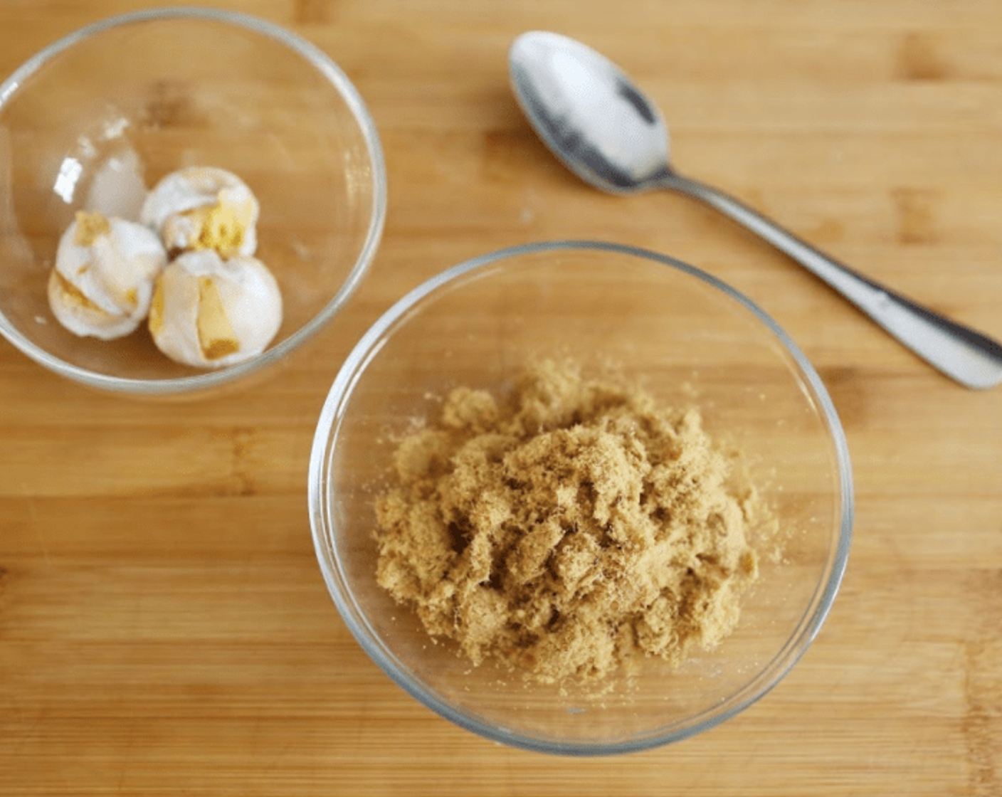 step 2 Place eggs and and Pork Floss (3/4 cup) into two separate bowls.