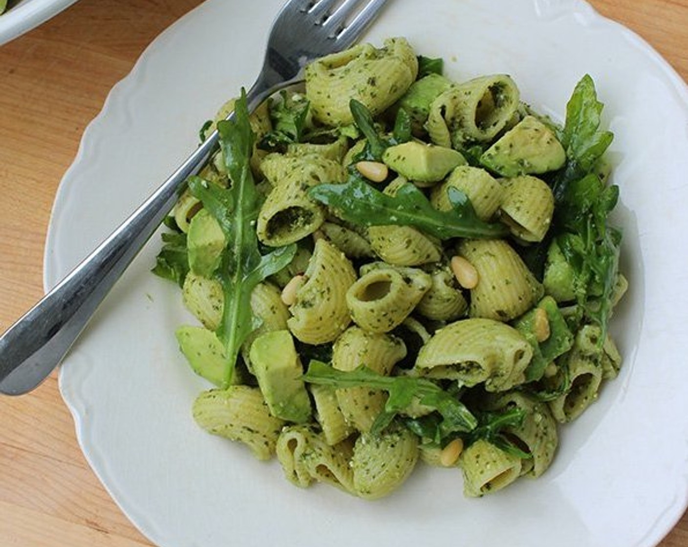 step 8 Add the avocado to the pasta and toss gently to combine. Taste for seasonings and serve at room temperature.