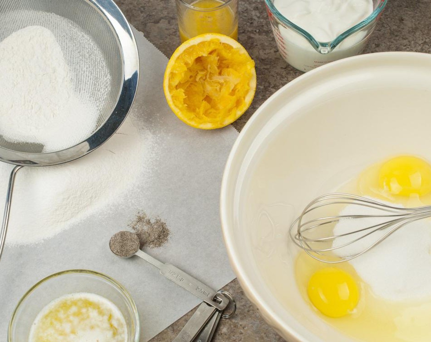 step 3 In a large bowl using an electric mixer beat together Granulated Sugar (1 cup), Farmhouse Eggs® Large Brown Eggs (2), and 2 tsp zest from Oranges (2) until light, creamy and triple in volume, approximately 3-4 minutes.