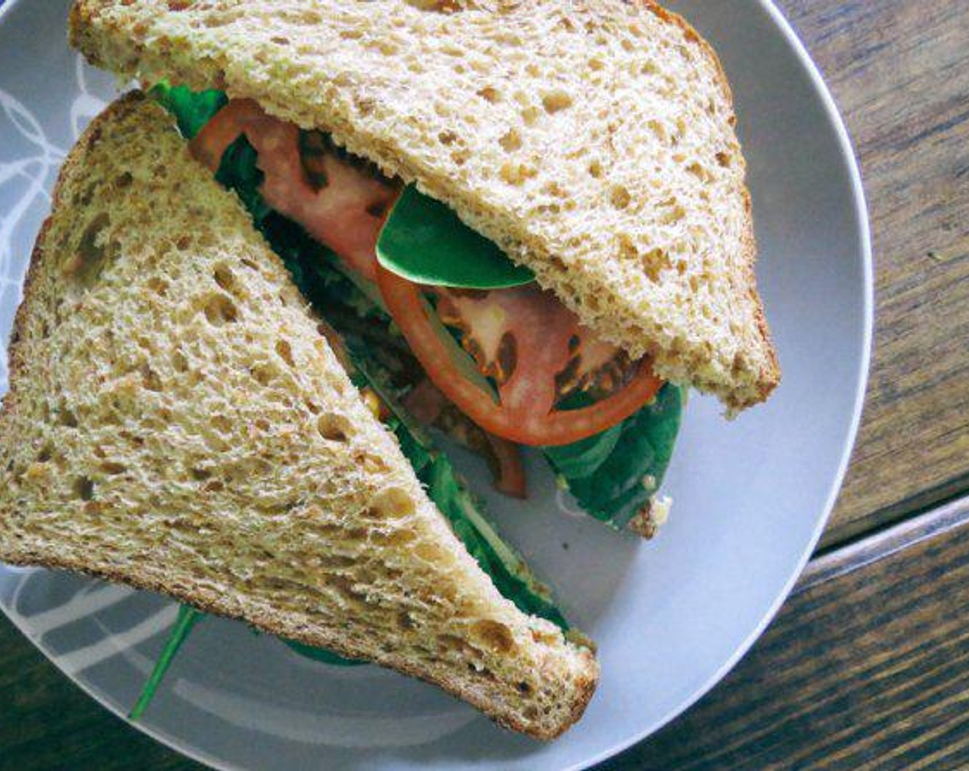 step 5 Use remaining pesto to spread on each slice of toasted bread. Spoon Basil Pesto Chickpea mixture onto slice of bread, add fixings of your choice and finish with remaining slice of bread.