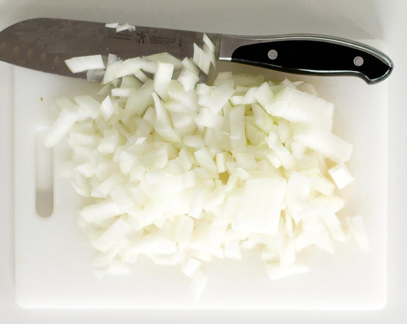 step 7 Chop the Yellow Onion (1) and mince the Garlic (2 cloves).
