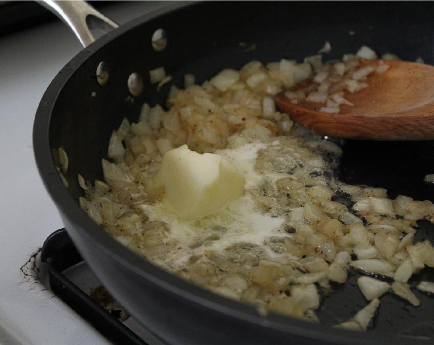 step 9 Sauté the onion in 2 tbsp. bacon grease and a pinch of salt until soft, about 5 minutes. Melt in 2 tbsp of Unsalted Butter (2 Tbsp)