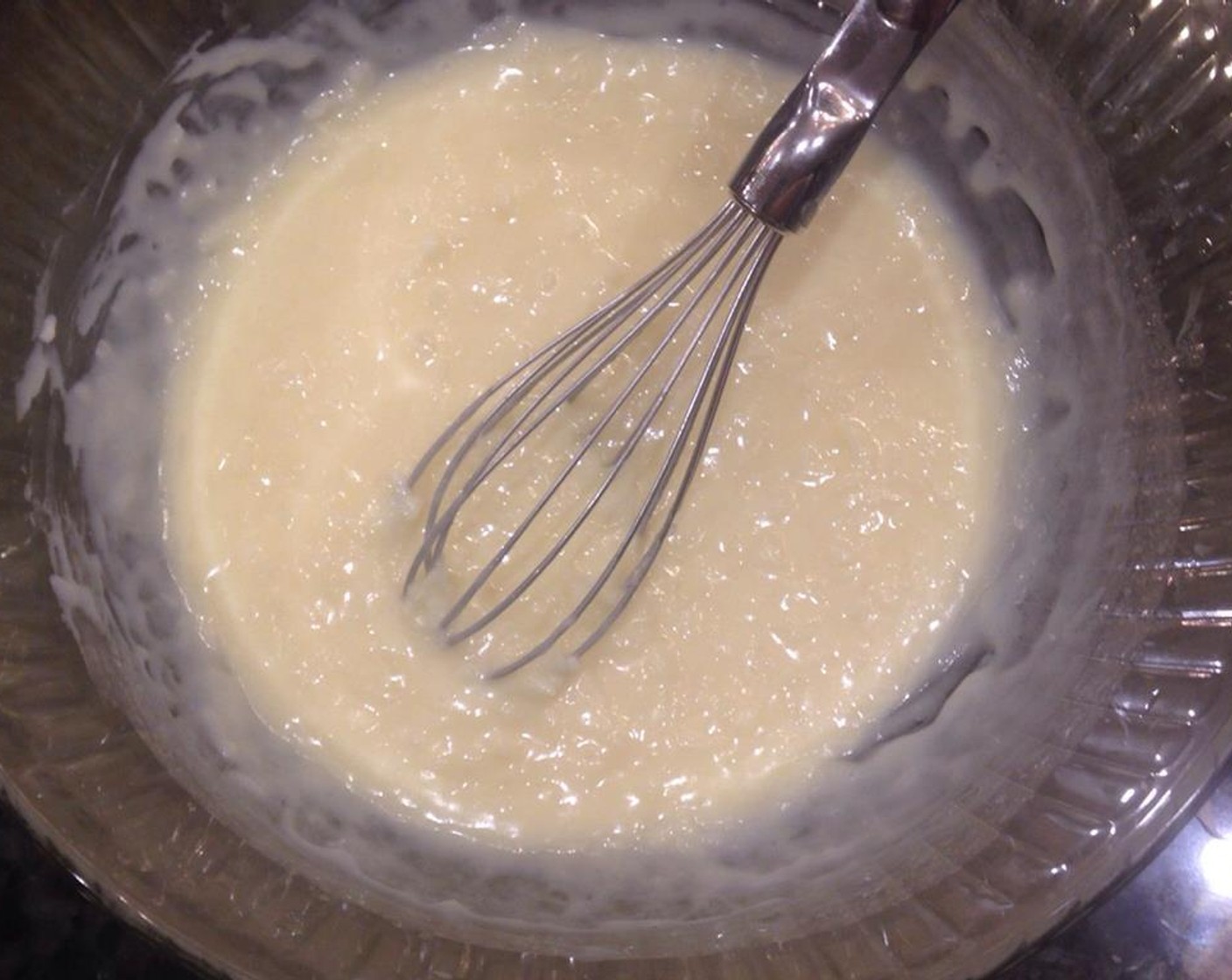 step 3 In a separate large bowl, beat Sweetened Condensed Milk (1 1/3 cups) and Salted Butter (1/2 cup) until smooth. Add Unsweetened Coconut Flakes (1 1/3 cups).