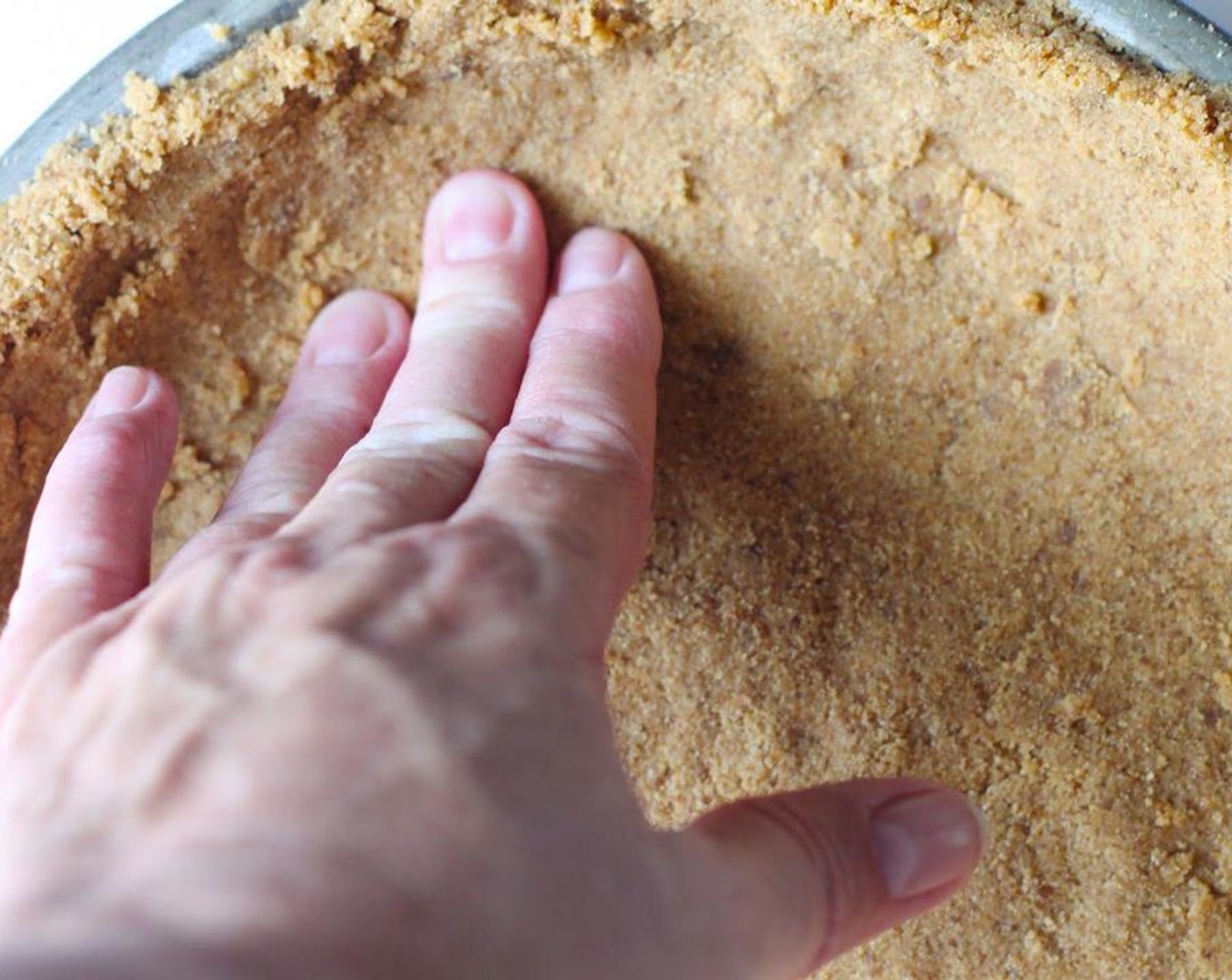 step 3 Pour and spread the mixture evenly in an 8 or 9-inch pie shell; pressing to form a nice crust.