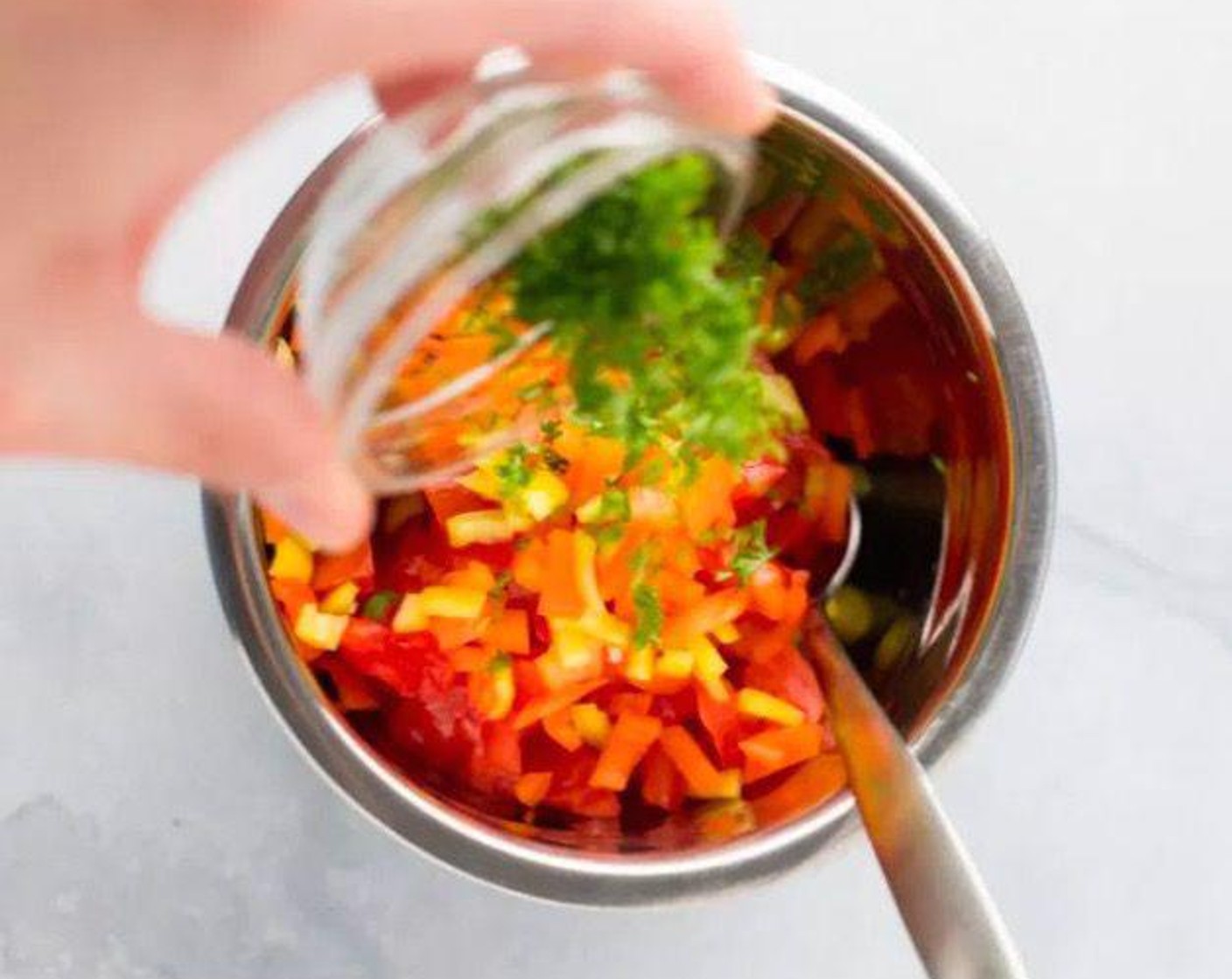 step 1 Stir together Tomatoes (2 cups), Mild Banana Peppers (2), Fresh Parsley (1 Tbsp), Salt (1/4 tsp), Ground Black Pepper (1/4 tsp), and Apple Cider Vinegar (1 Tbsp) in a small mixing bowl.