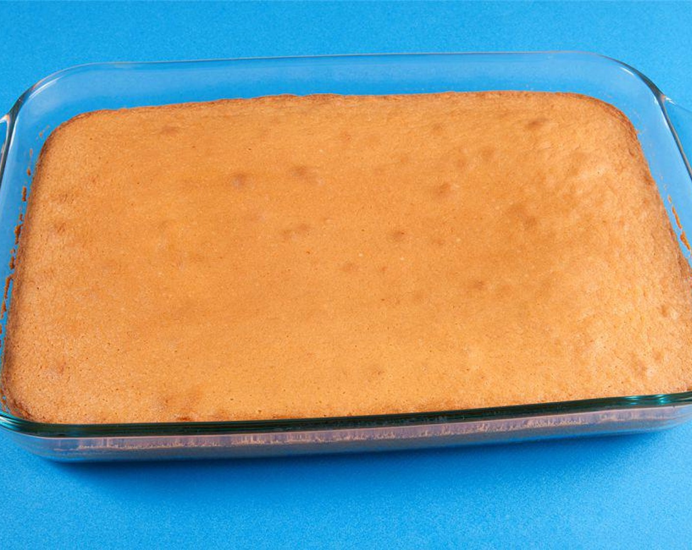 step 1 If you’re baking a cake for this recipe, let it cool down for 10 minutes. Remove it from the pan then cut it into four equal parts using a knife.