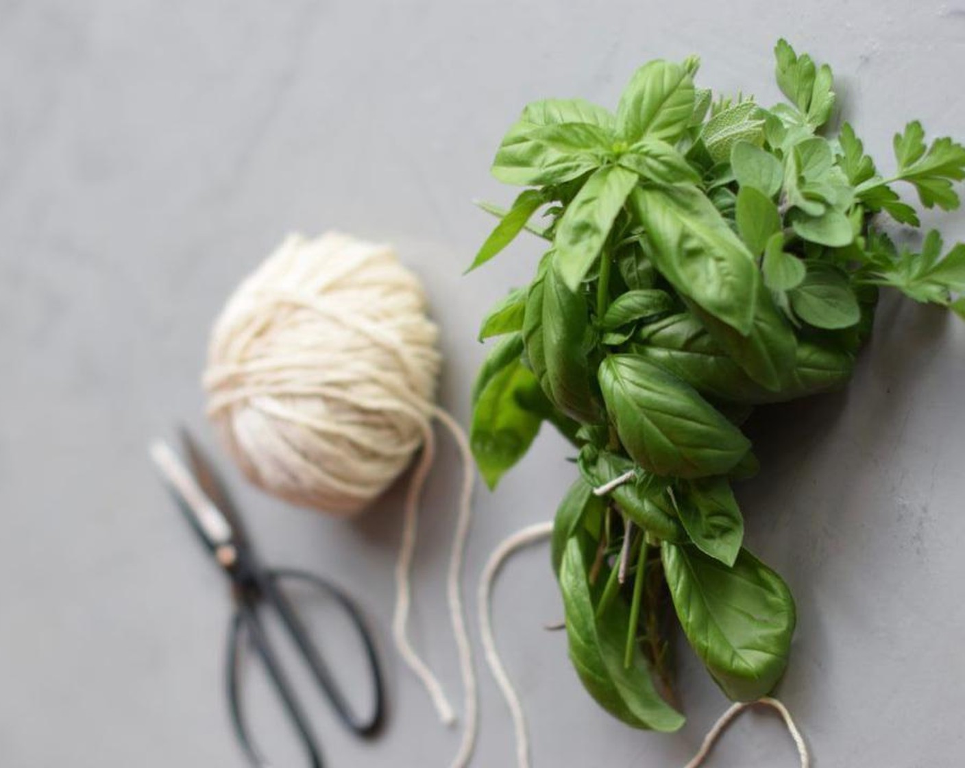 step 4 Take the rest of the herbs and tie into small bunches (bouquet garni) with kitchen string – one bunch for each fish. Slice Lemons (2) thickly and stuff each fish with the slices and herb bouquet. Drizzle over the marinade, making sure to spoon it liberally into the cavity and the slits.