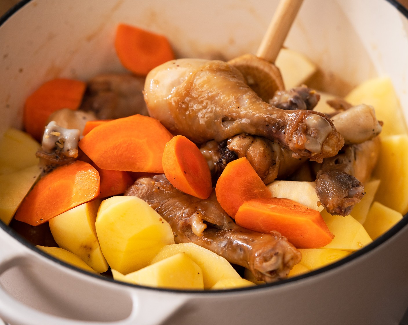 step 6 After 10 minutes, add Carrot (1), Potatoes (2), Sweet Potato (1), and Water (1/2 cup). Stir until well combined. Cover with a lid and simmer for 10-15 minutes, stirring occasionally.