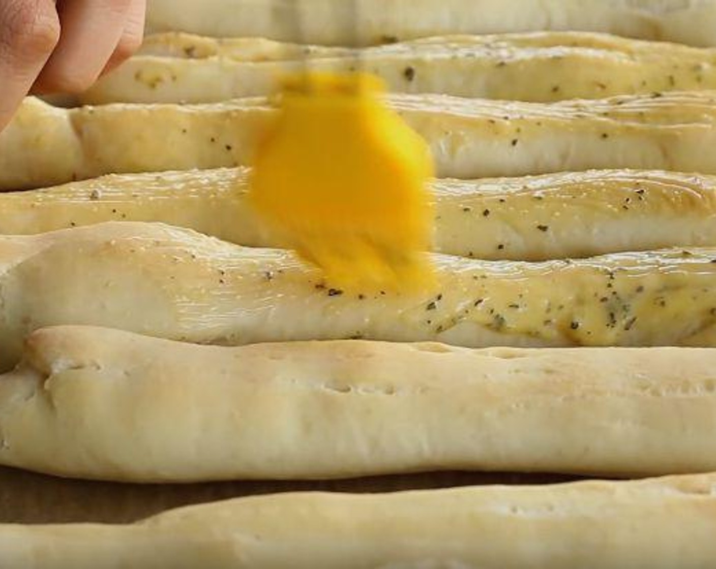 step 6 Meanwhile make the garlic butter by mixing together the Butter (3 Tbsp), Italian Seasoning (1/4 tsp), Salt (1/4 tsp), and Simply Organic Garlic Powder (1/4 tsp). As soon the breadsticks come out of the oven, brush them with butter mixture.
