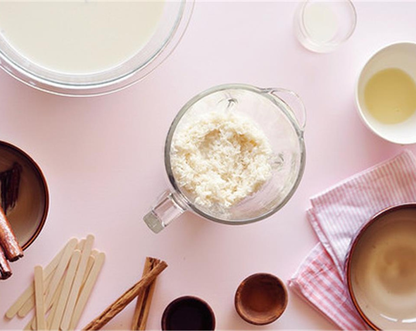 step 3 Remove and discard cinnamon sticks. Transfer the long grain rice with a slotted spoon, to a blender or food processor. Reserve the liquid. Blend on high until completely smooth, about 3 minutes.