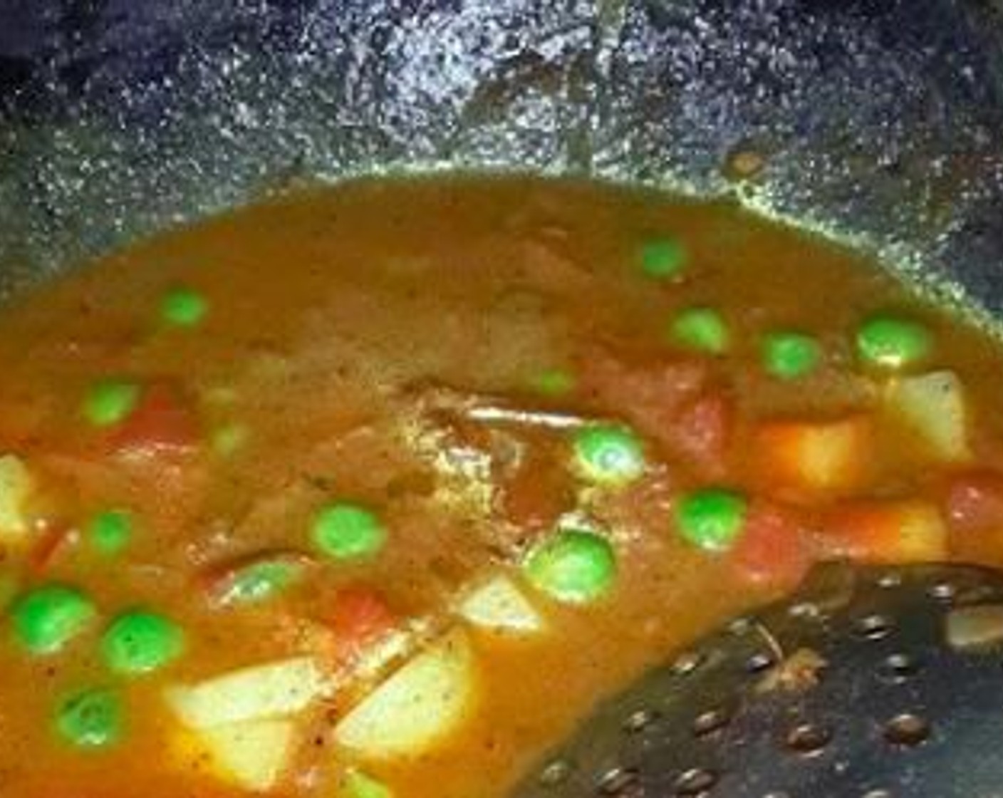 step 7 Stir again and saute the whole mixture till you see butter releasing from the sides. Now add 1/4 cup of water and close the lid till all veggies cooked and all the masala become dry.