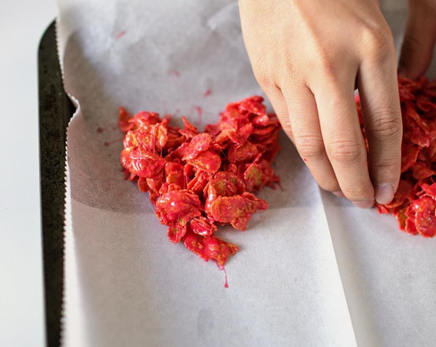 step 3 Take handfuls of the coated cornflakes and shape them on wax paper.