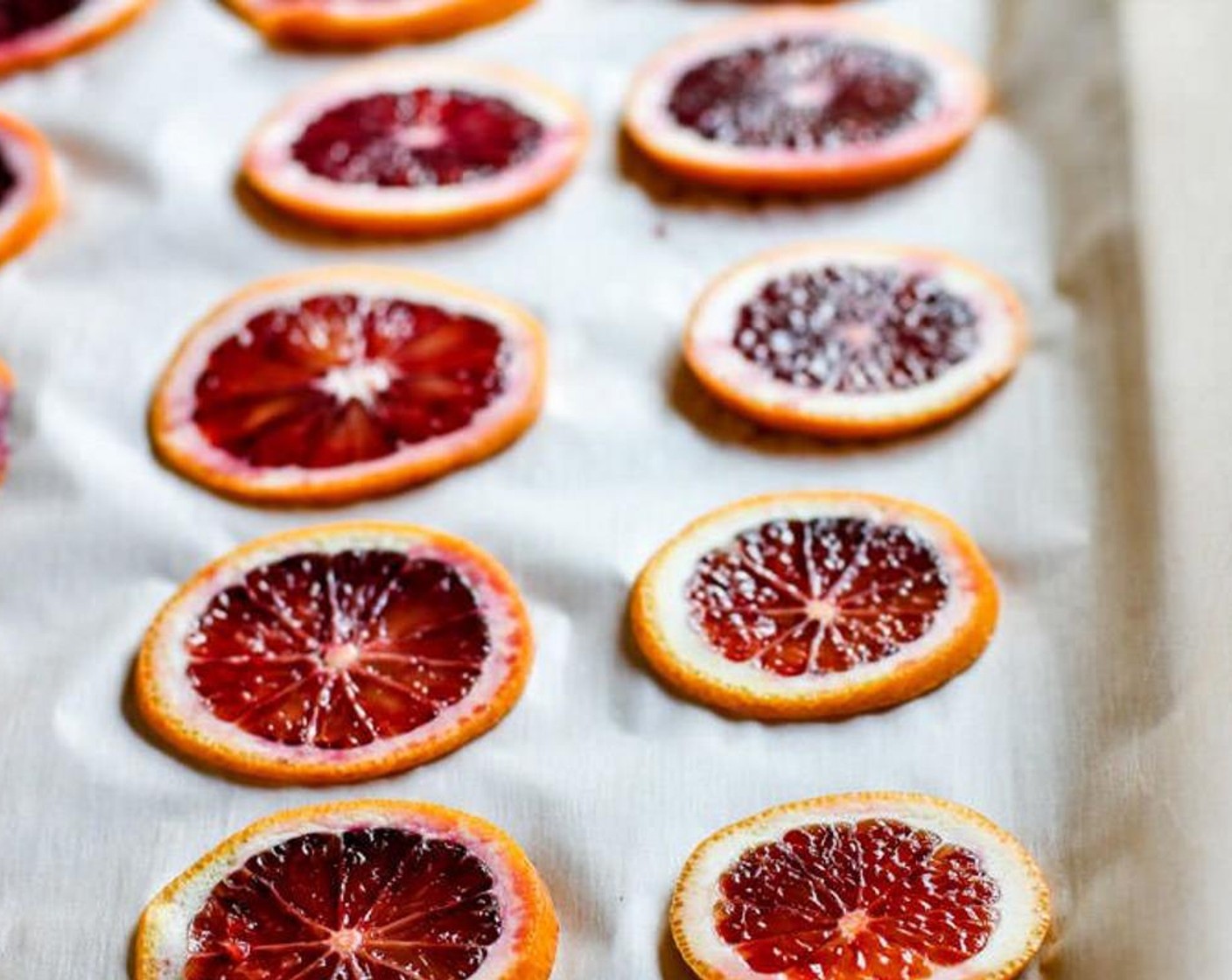 step 1 Preheat oven to 200 degrees F (95 degrees C). Lay the Oranges (2) on a baking sheet, lined with parchment paper.
