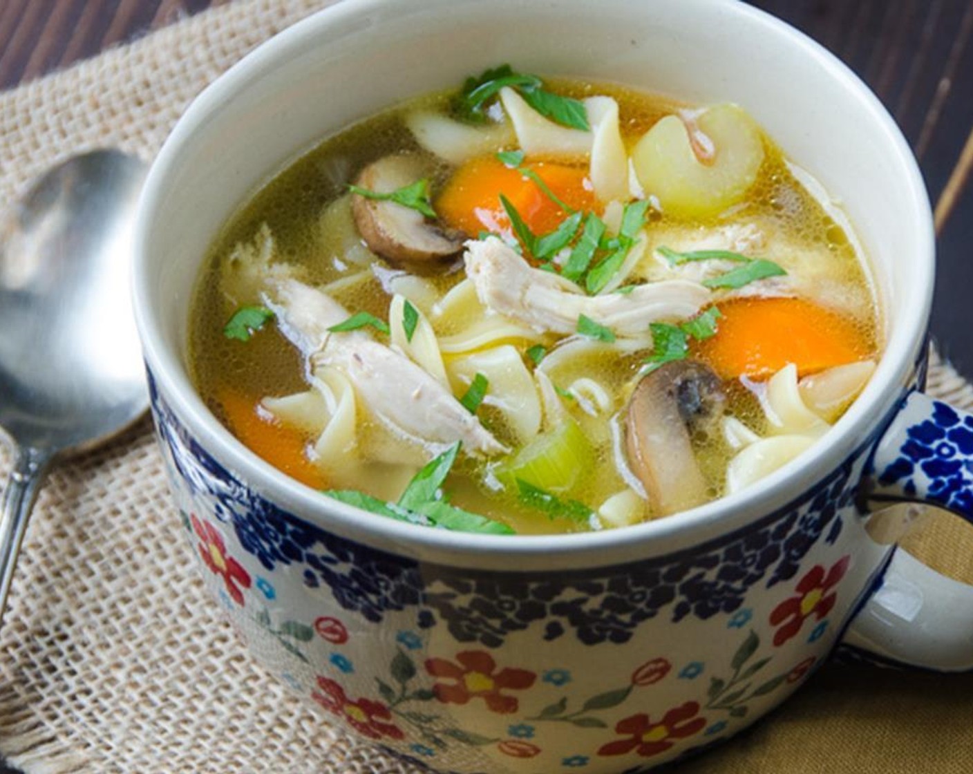 step 11 Place a half cup of Pre-Cooked Egg Noodles (8 oz) in each bowl. Ladle chicken soup over the noodles. Sprinkle with Fresh Parsley (to taste) and serve.