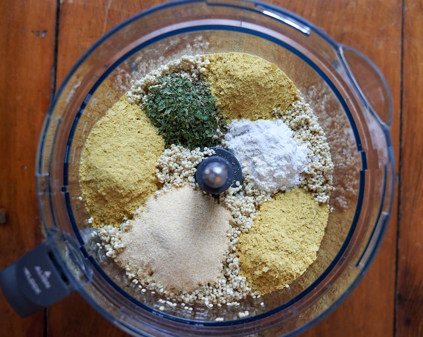 step 3 Add the quinoa, Water (1 cup), the Baking Powder (1 Tbsp), McCormick® Garlic Powder (2 Tbsp), Italian Seasoning (2 Tbsp), Sea Salt (1 tsp) and Nutritional Yeast (1/4 cup) to a food processor. Blend until a smooth batter forms.
