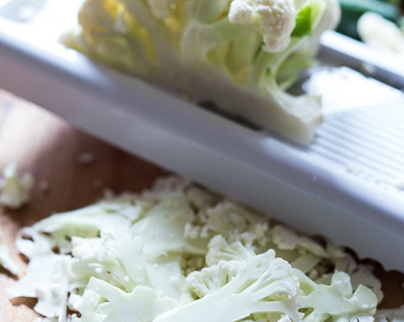 step 3 Shave the Cauliflower (1/2 head). If you don’t have a mandolin, just chop into bite-sized pieces.