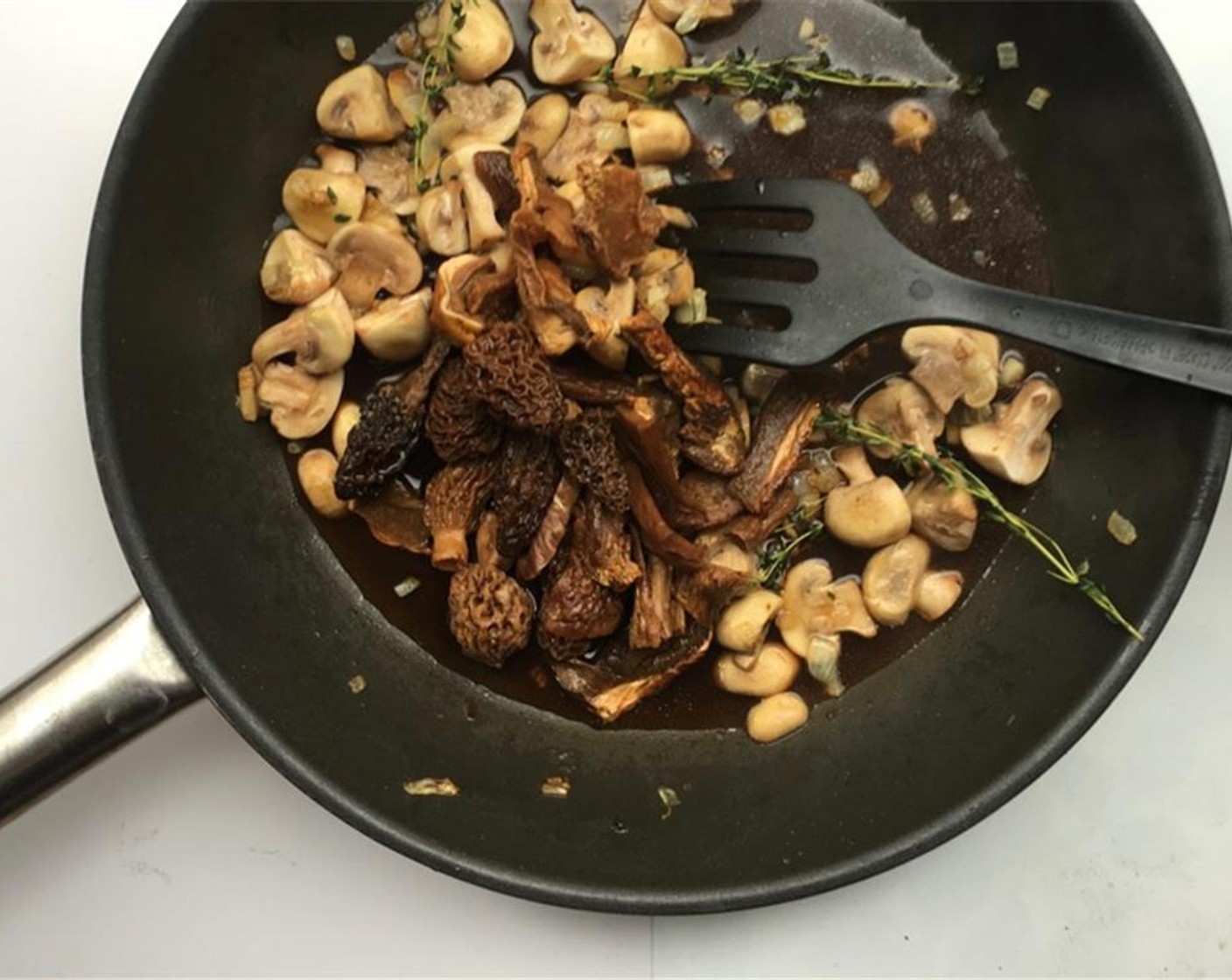 step 4 Stir the mushrooms and onion and fry them for 3 minutes. Then add the soaked mushrooms, the soaking liquid and the Dry White Wine (1/4 cup).