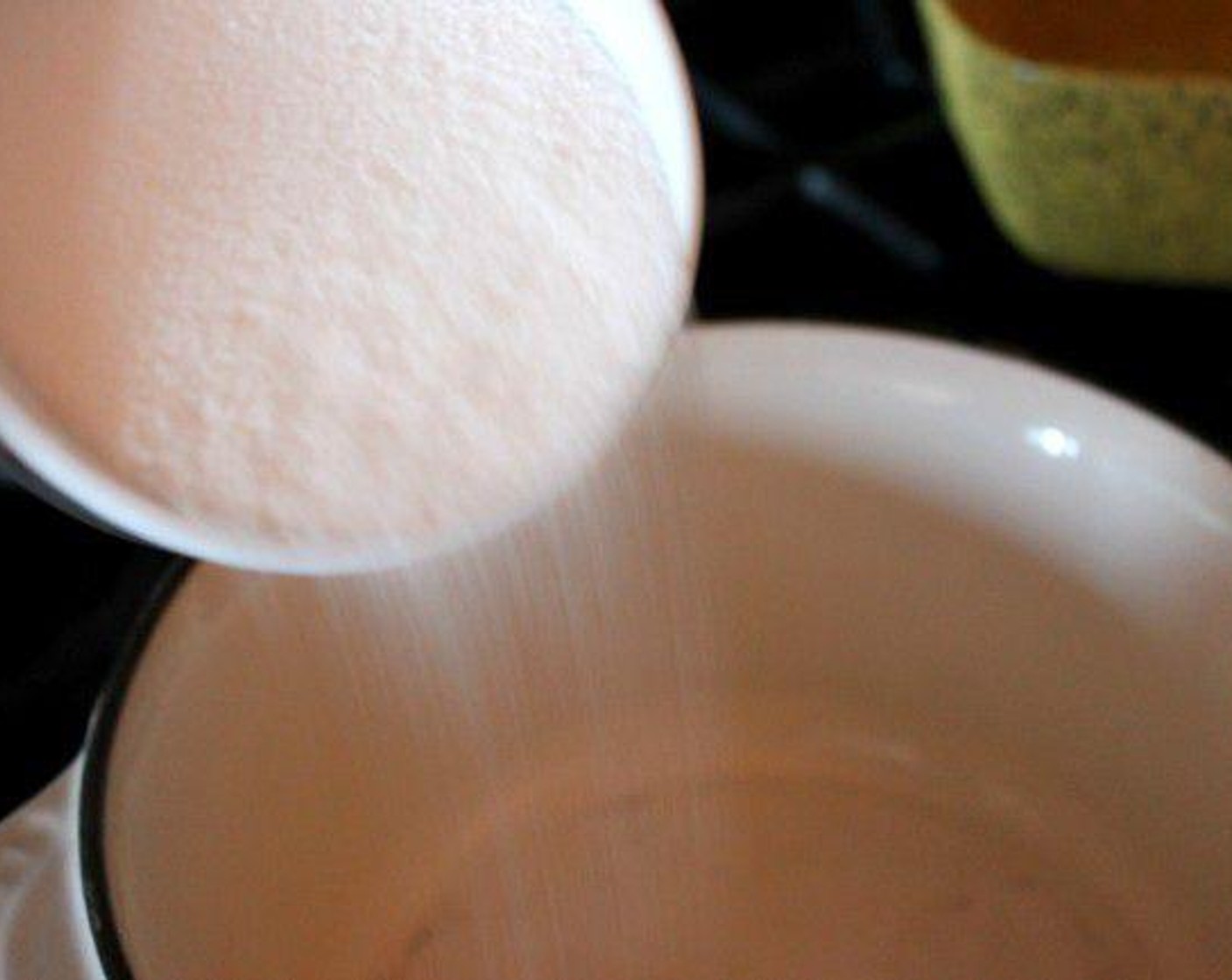 step 1 In a medium pot combine the Caster Sugar (1 cup) and Water (1/2 cup). Stir it once to blend the sugar, then let it simmer until it’s a light golden color.