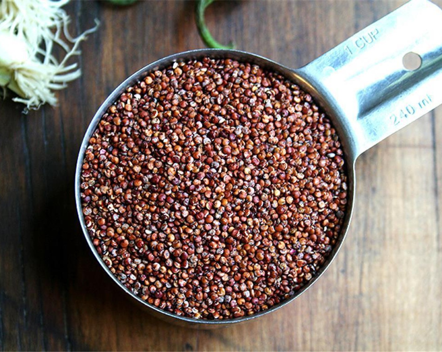 step 1 Bring a pot of water to boil. Meanwhile, place Quinoa (1 cup) in a sieve and rinse under cold water. When water boils, add quinoa and simmer for 9 minutes. Drain in an fine-mesh sieve and run under cold water until cool. Set aside to dry.