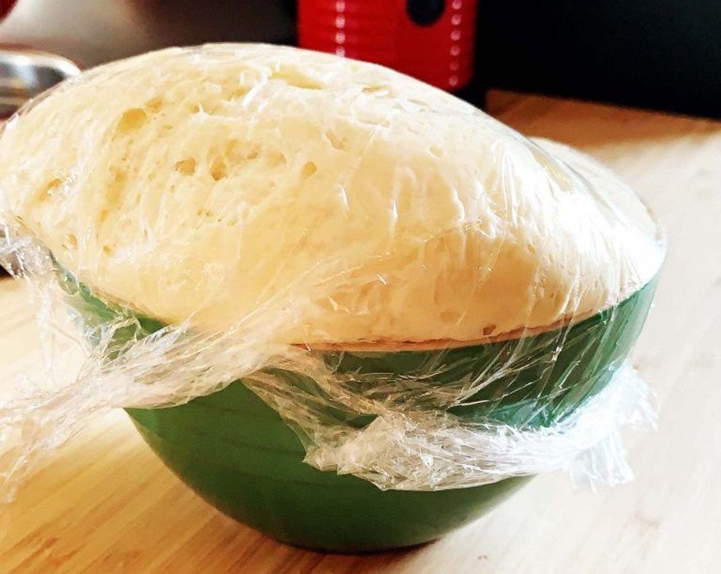 step 4 Place the dough into a bowl, cover with plastic wrap and place it in your oven while turned off. Let it rise for 3 hours.