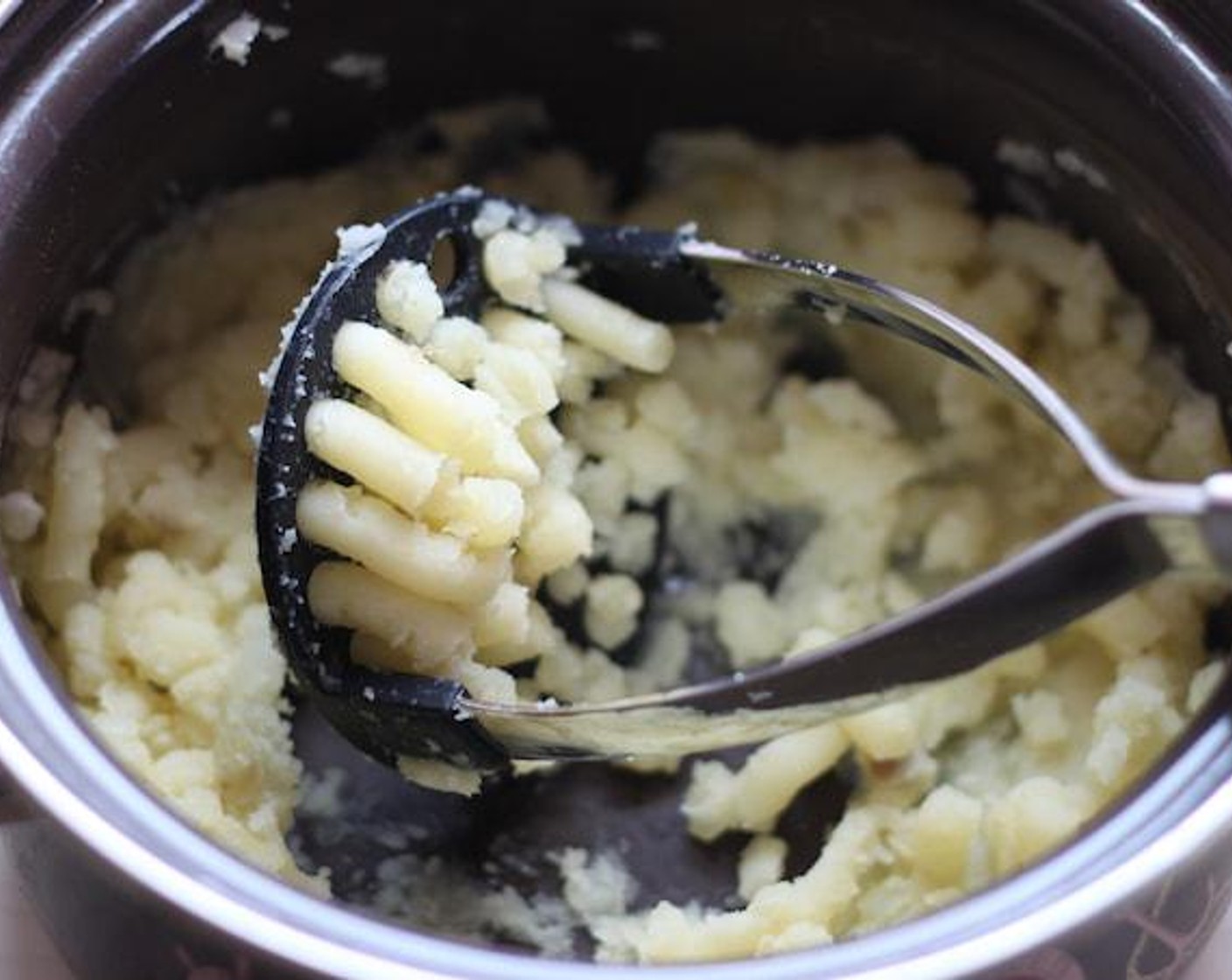 step 4 Wash and peel the Potatoes (2), then boil them for 15 minutes. Mash the potatoes with a bit of Salt (to taste) and Ground Black Pepper (to taste).