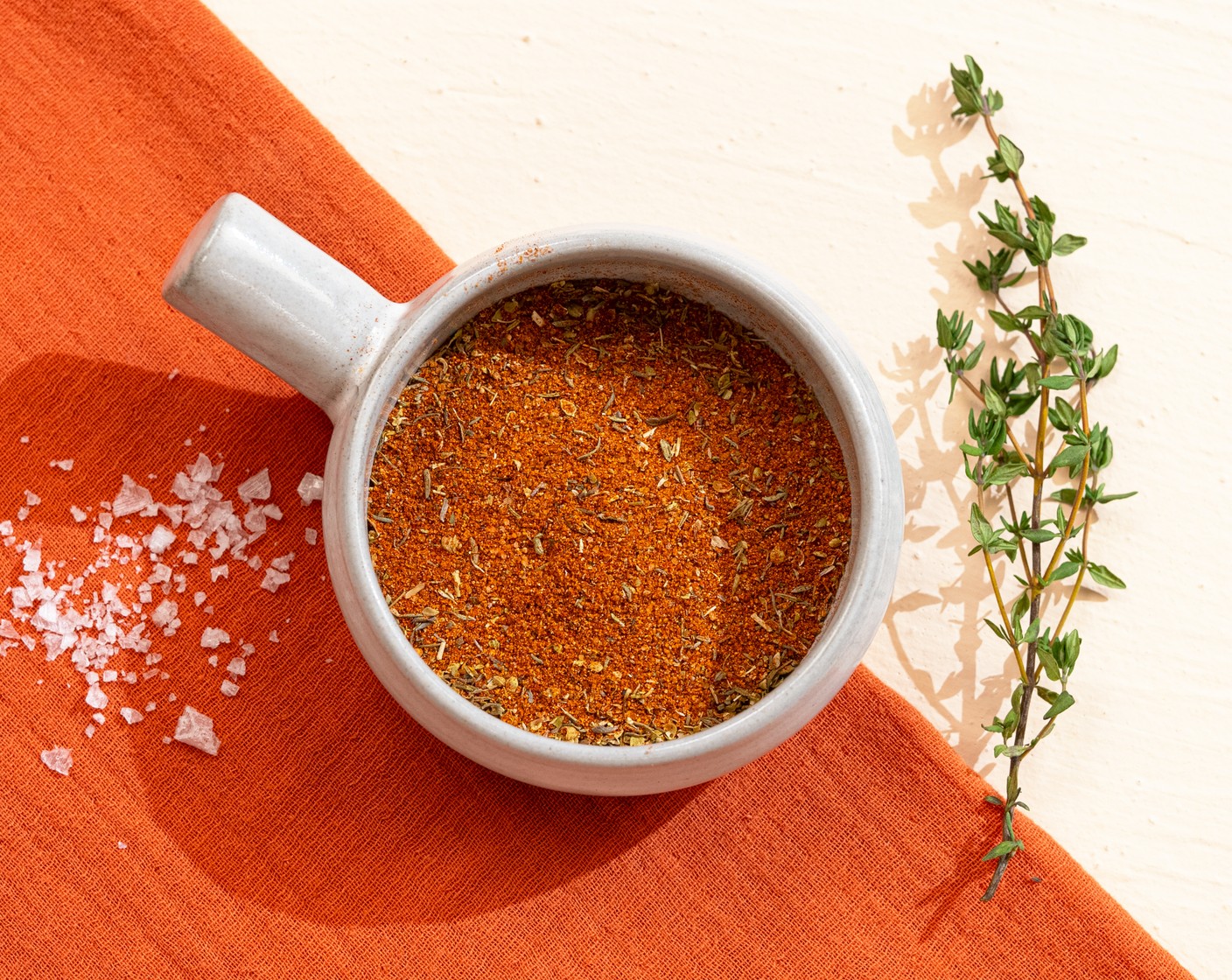 step 1 In a small mixing bowl, add the Dark Brown Sugar (3 Tbsp), Smoked Paprika (3 Tbsp), Coarse Salt (3 Tbsp), Simply Organic Garlic Powder (2 Tbsp), Simply Organic Onion Powder (2 Tbsp), Ground Black Pepper (1 Tbsp), Baking Powder (1/2 cup), Dried Oregano (1/3 cup), Dried Thyme (1/3 cup), and Cayenne Pepper (1/3 cup) together and mix well. Store in an air-tight container for up to 6 months in a cool, dry place.
