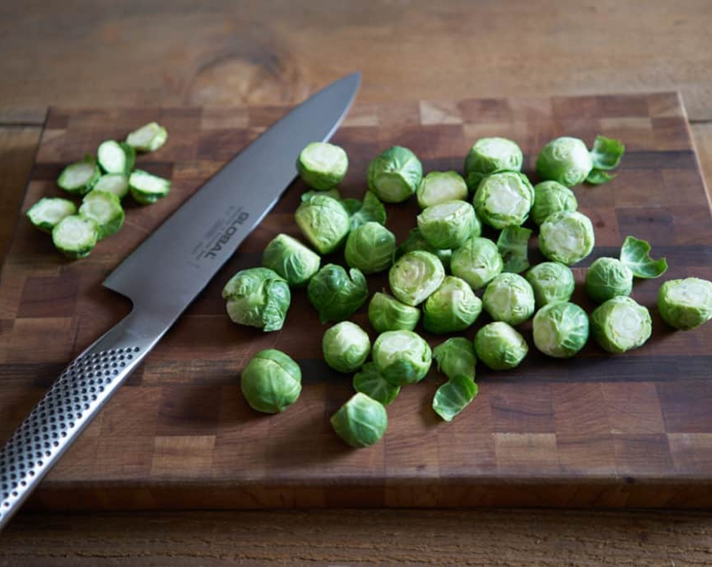 step 2 Wash and drain Brussels Sprouts (10 cups), trim off the bottom stems.