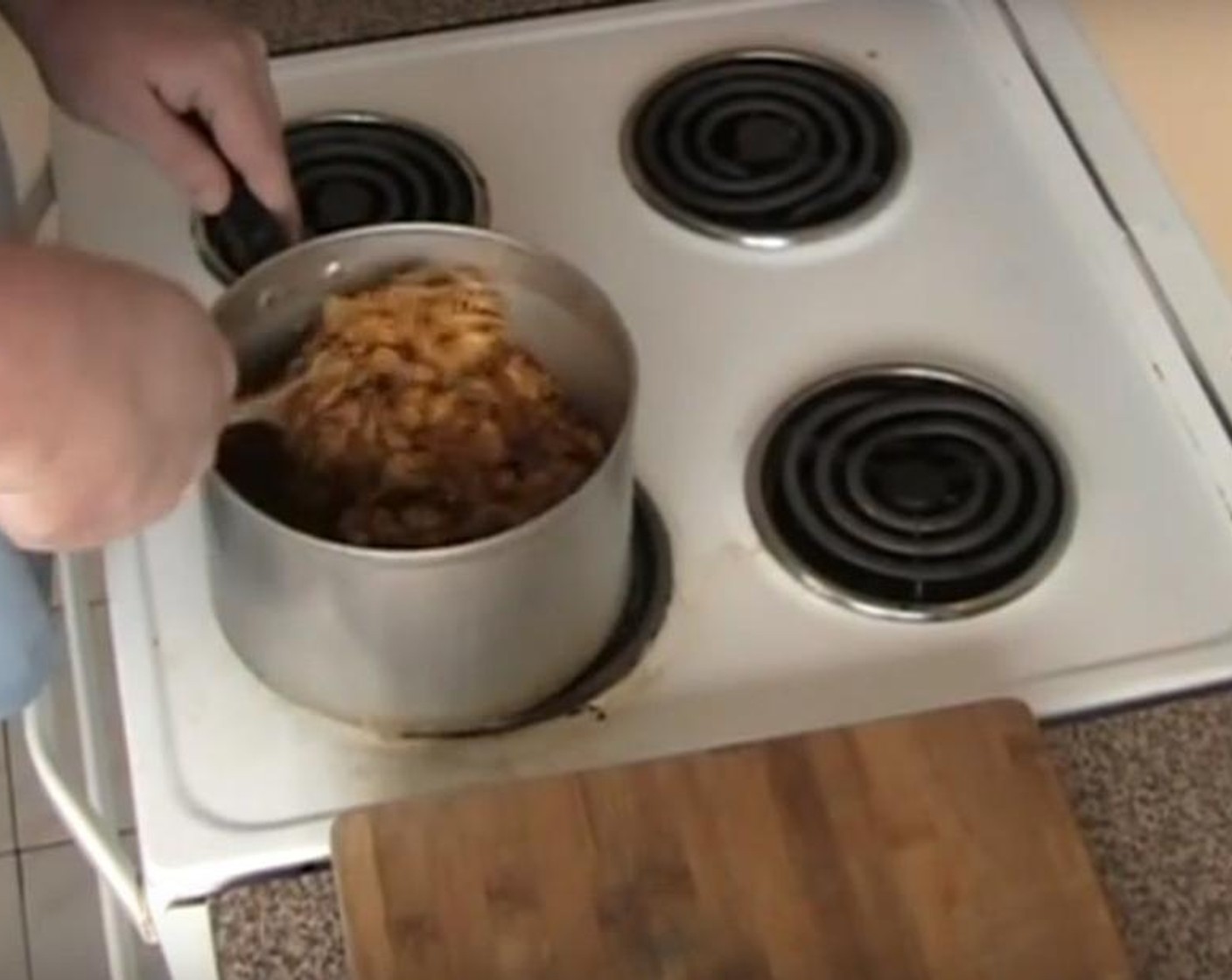 step 3 Add in the Corn Flakes (2 1/2 cups) to the melted mixture. Gently stir together.