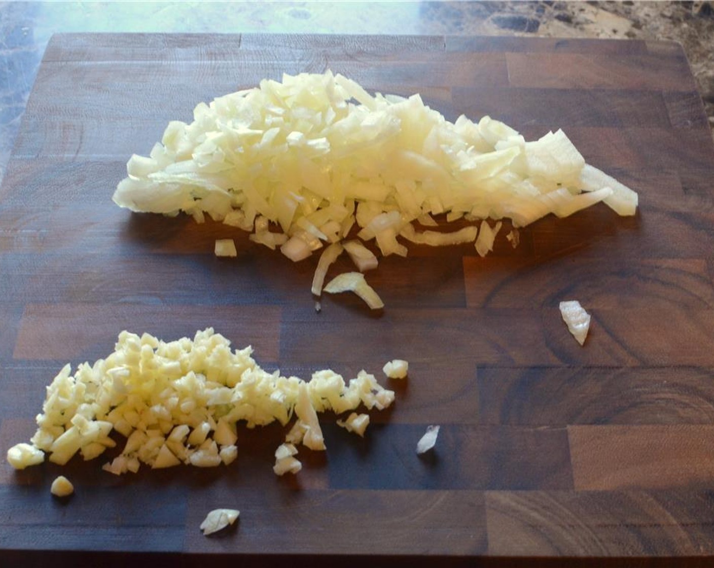 step 1 Preheat the oven to 375 degrees F (190 degrees C). Bring a large pot of salted water to a boil, so it is ready when you need to cook the Lasagna Sheets (12). Finely chop the Onion (1/2) and Garlic (3 cloves).