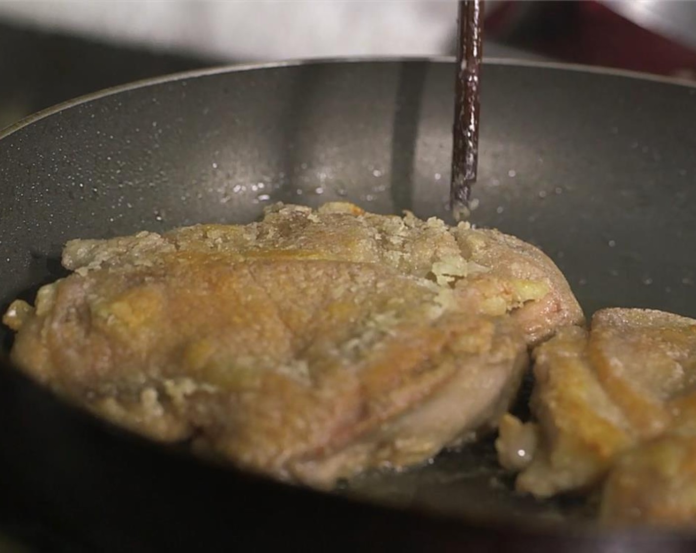 step 5 When golden and crispy on one side, flip and cook the other side of the thighs. When cooked through, remove and set aside, while you prepare the sauce.