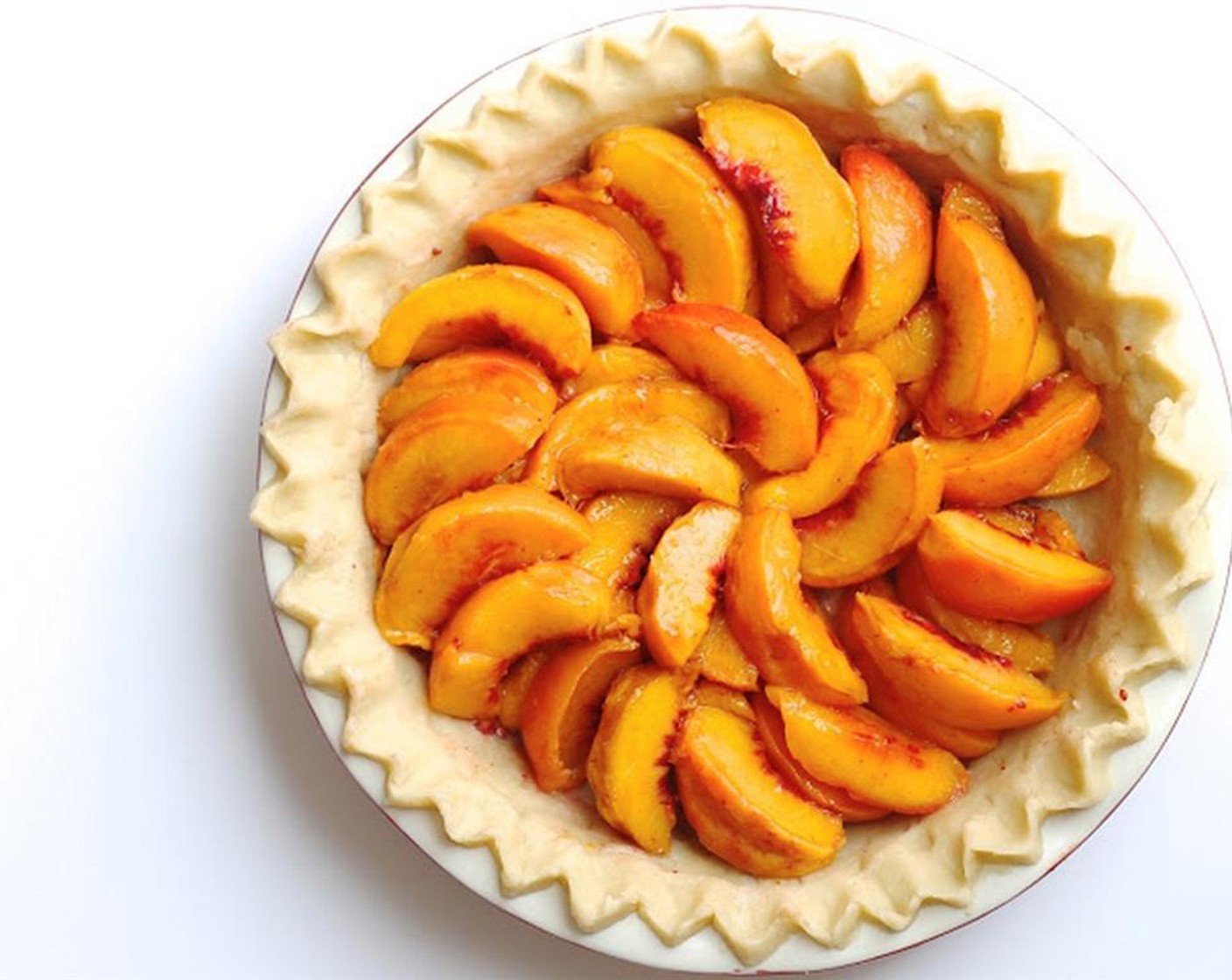 step 3 Cut them into halves, quarters or eighths, whatever suits you. Lay your peaches in the Pie Crust (1).