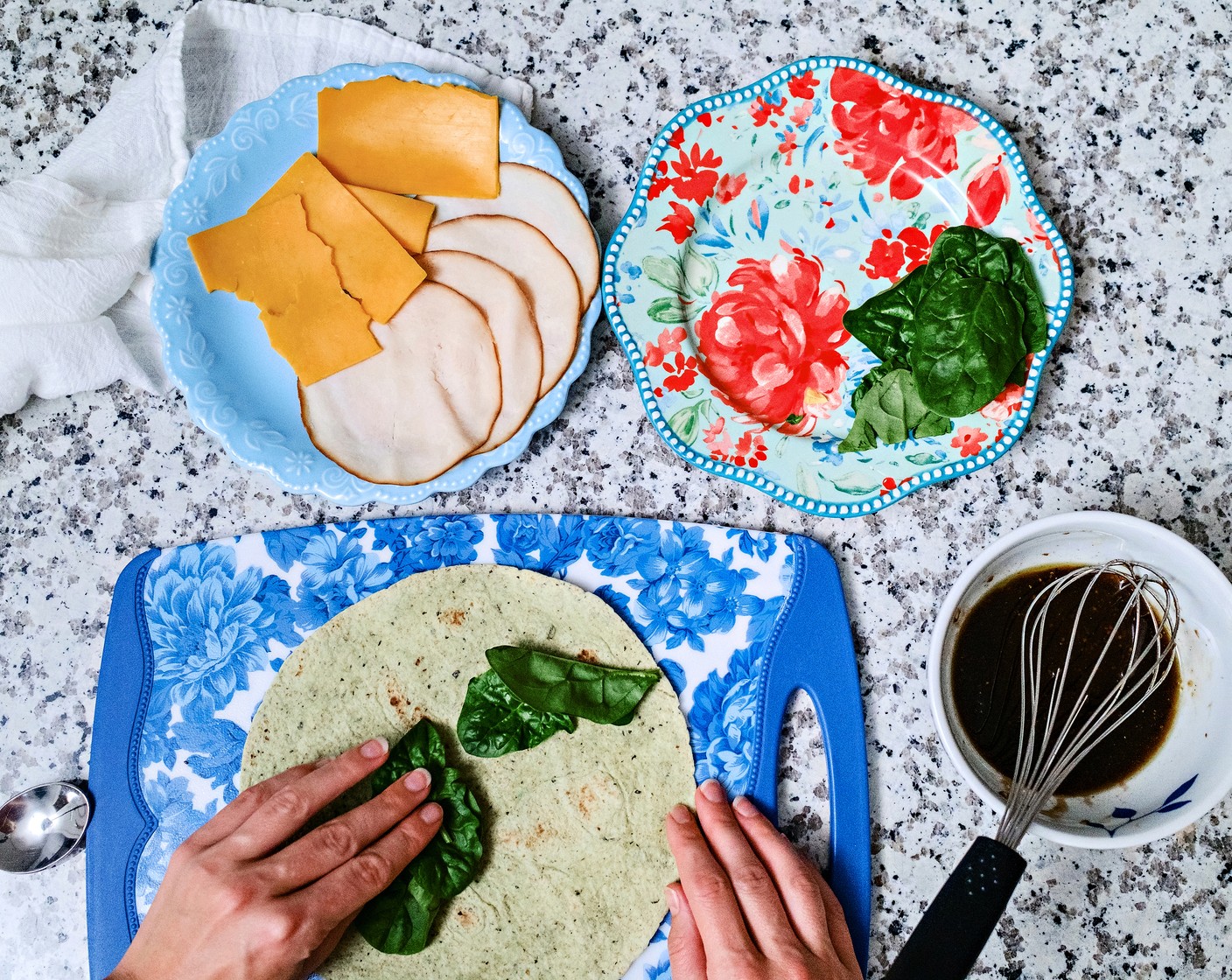 step 3 Place a handful of Spinach Leaves (1 handful) on the wrap.