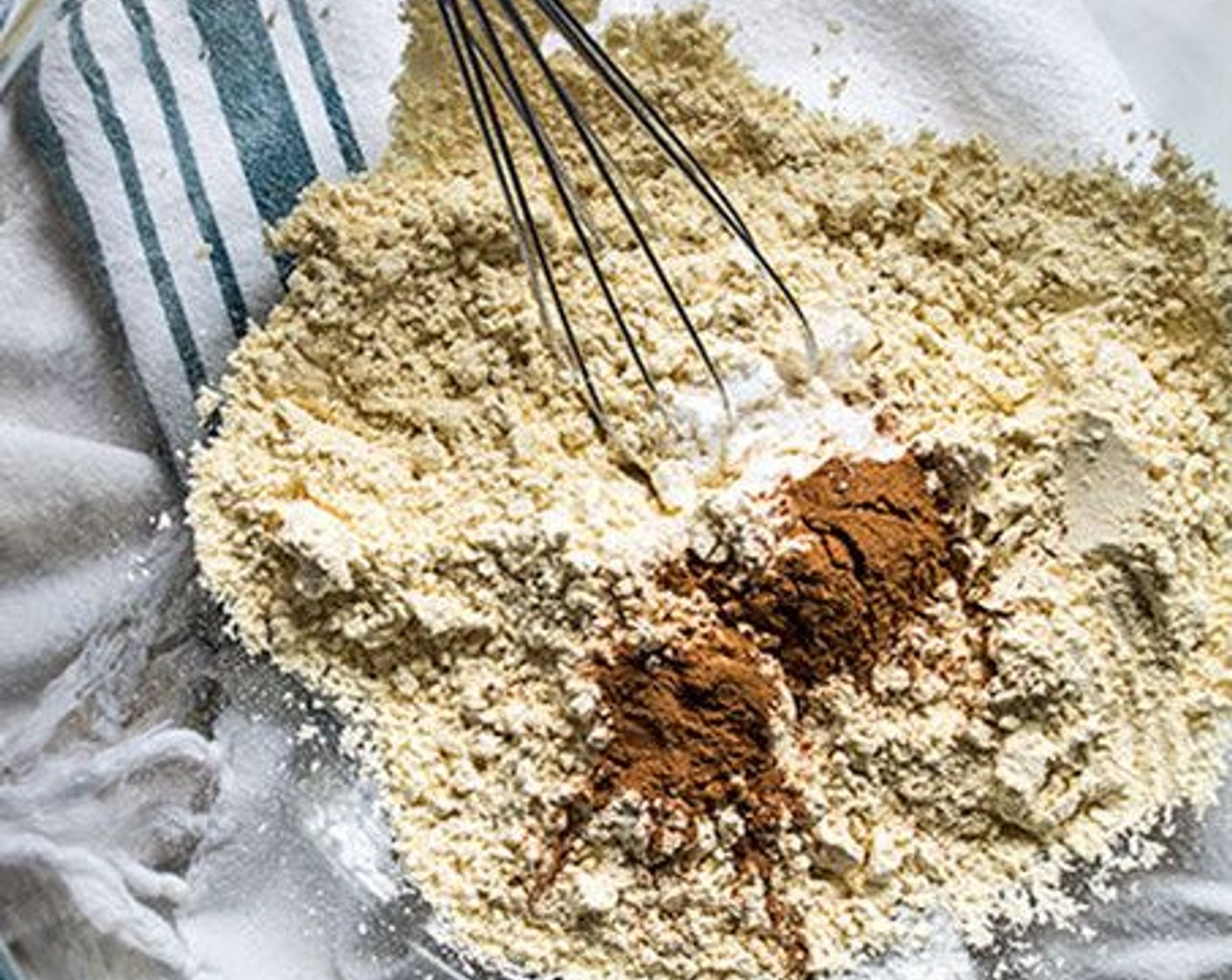 step 2 Mix Chickpea Flour (1 1/2 cups), Baking Soda (1 tsp), Simply Organic Cinnamon, Ground (1 tsp), and Salt (1/4 tsp) in a large bowl.