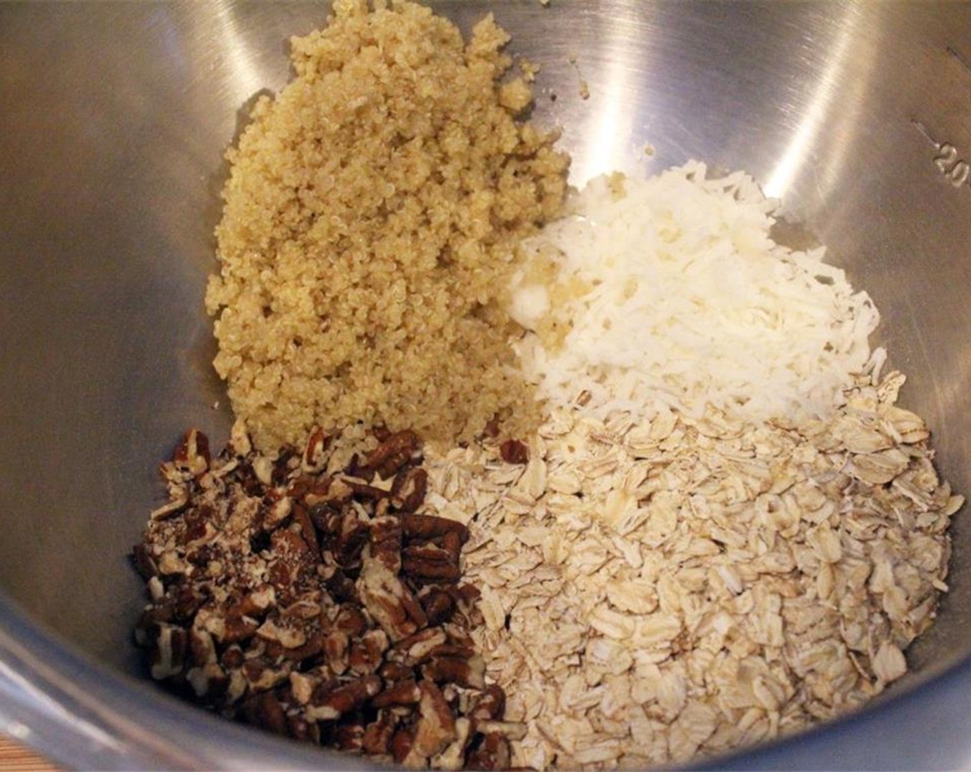 step 5 Combine the Old Fashioned Rolled Oats (1 1/2 cups), Sweetened Shredded Coconut (3 Tbsp), pecans and quinoa in a large bowl.