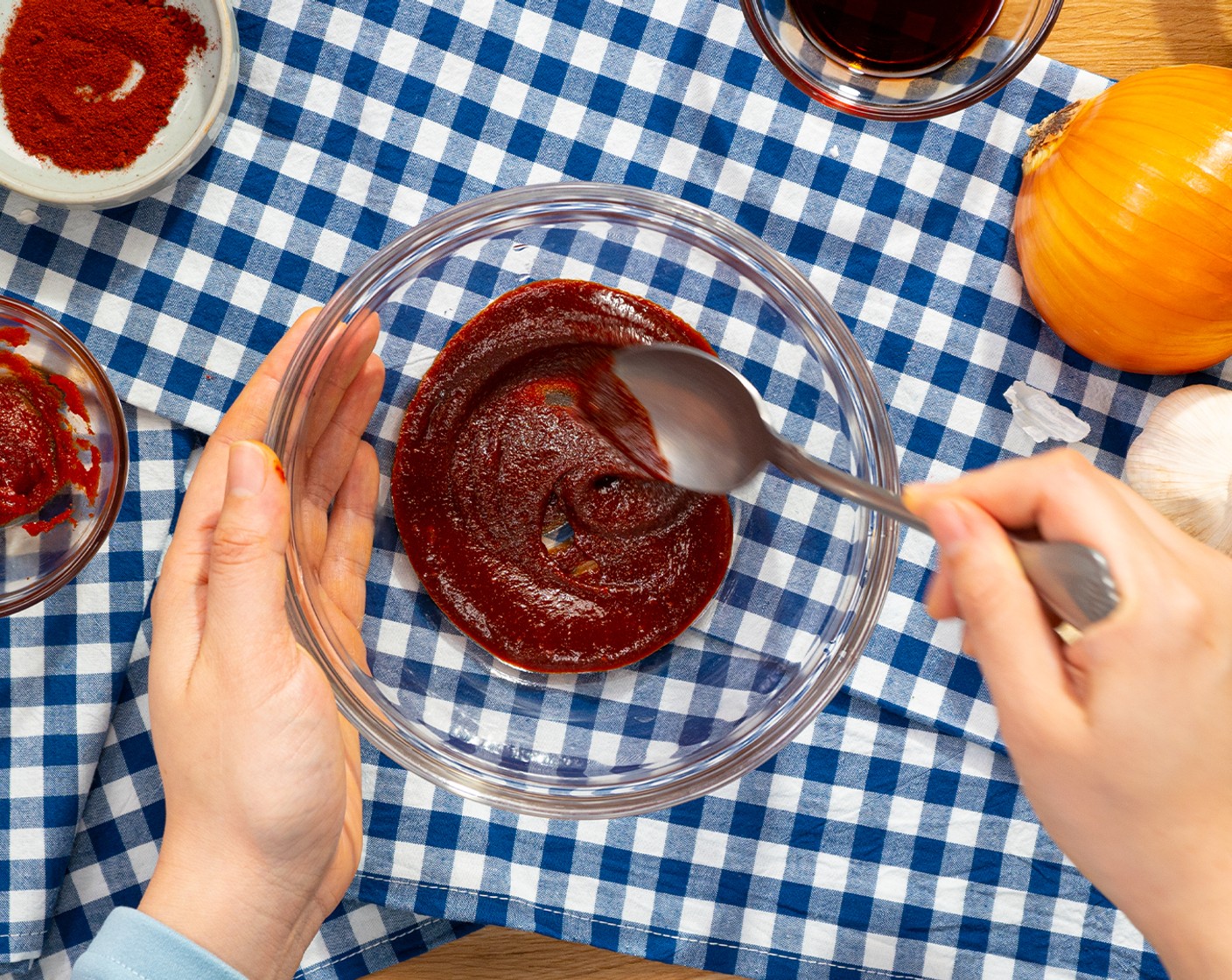 step 3 In a small bowl, combine Gochujang (2 Tbsp), Soy Sauce (1 1/2 Tbsp), and Paprika (1 tsp) together.