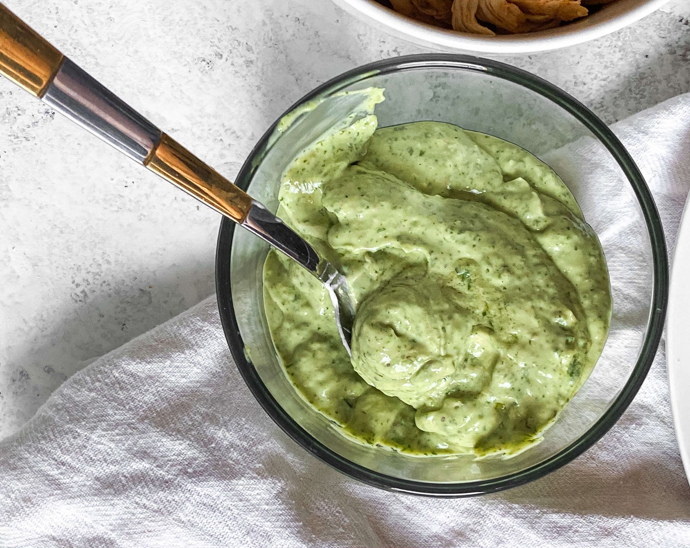 step 3 Combine the Avocado (1/2), Yogurt (1/4 cup), Fresh Cilantro (1/4 cup), Lime (1/2), Salt (to taste), and Ground Black Pepper (to taste) in a food processor and pulse until smooth.