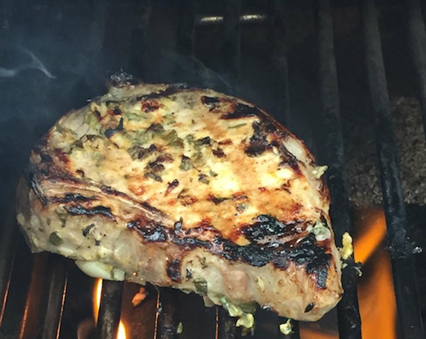 step 3 Prepare a grill for direct heat cooking. Grill the thick center cut pork chops over a high flame until done to your liking. About 6 minutes per side for medium, 8 to 9 minutes per side for well.
