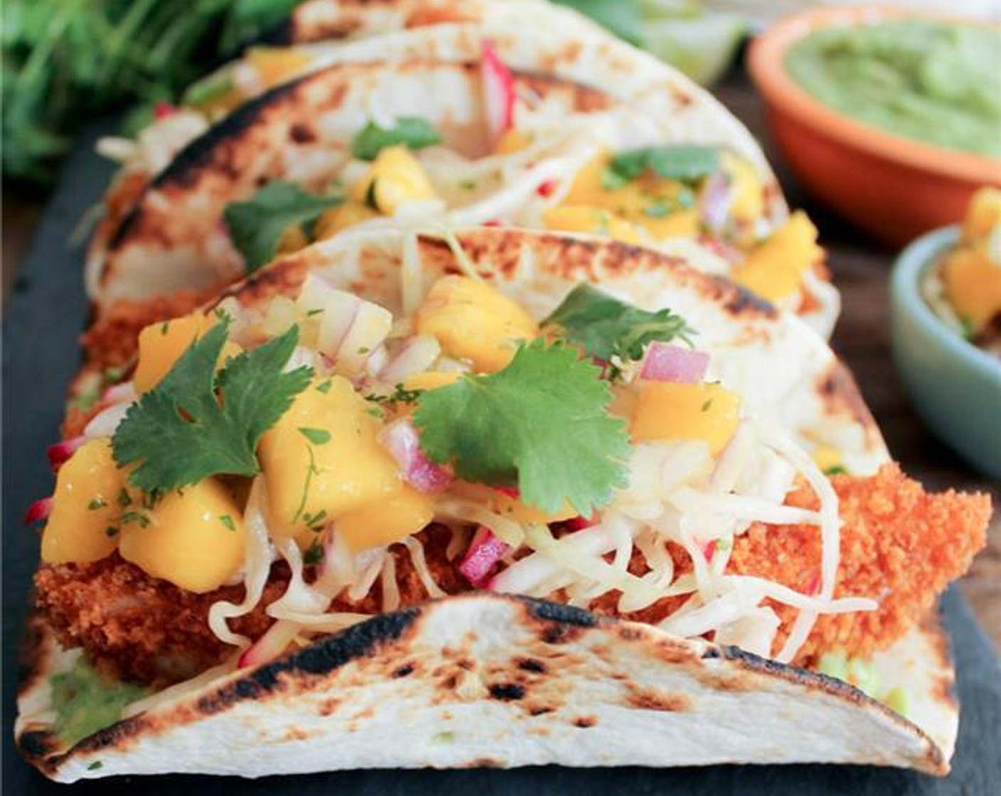 Crispy Fish Tacos with Mango Salsa & Avocado Salsa Verde