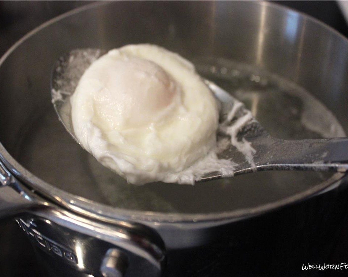 step 5 Gently crack each of the Eggs (2) into the simmering water and poach until whites are cooked through and yolk is soft - about 2-3 minutes. Season with salt and pepper (to taste). Set aside on paper towel to soak up excess liquid.