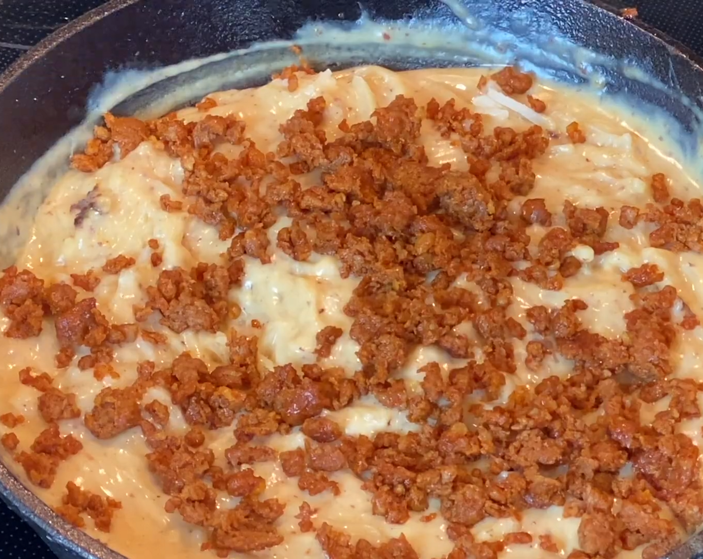 step 7 Sprinkle chorizo over top, then the rest of the Monterey Jack Cheese (1/2 cup).