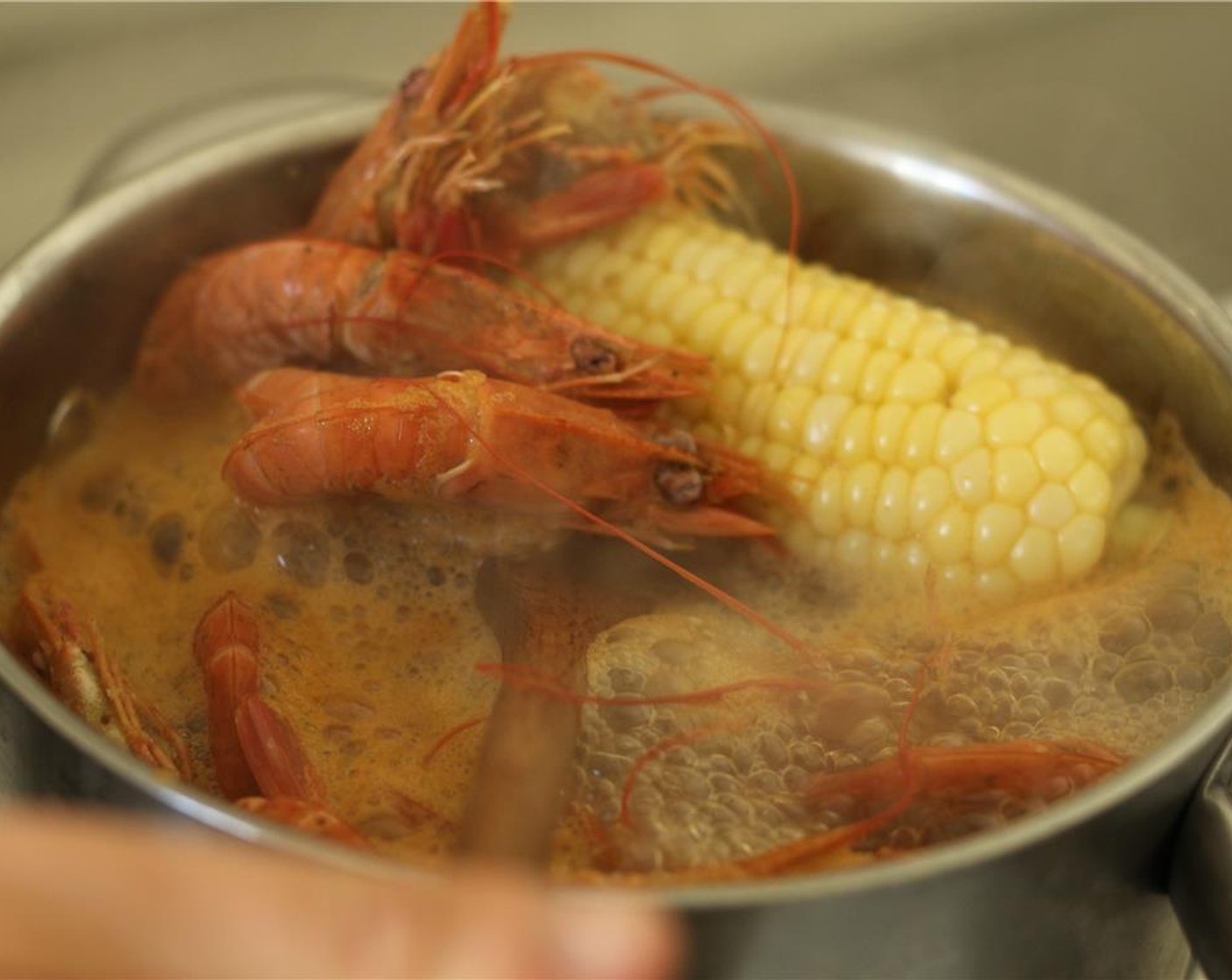 step 4 Continue cooking for 5 minutes, or until the shrimp are opaque and cooked through.