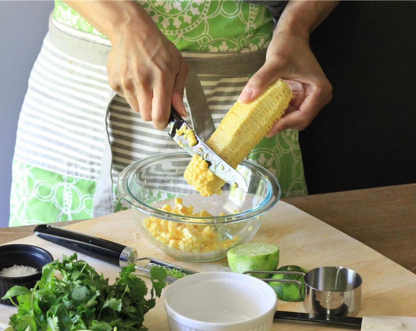 step 3 Chop and remove the seeds from the Jalapeño Pepper (1).  Chop the Scallion (1 bunch) and Fresh Cilantro (1 bunch).  Shuck the Corn (2 ears) and use a sharp knife to cut off the corn kernels from all sides. Put corn in a mixing bowl.