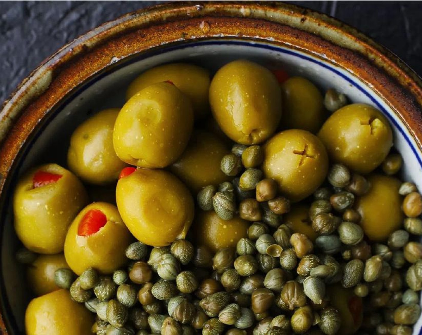 step 2 Stuff the turkey cavity with Capers (2/3 cup) and Green Olives (1 can).