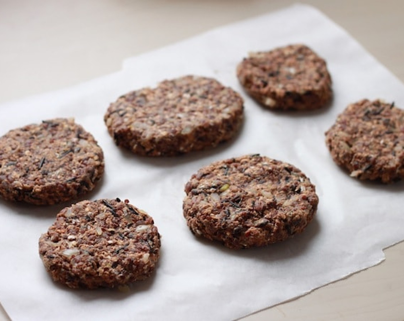 step 8 Make shapes with the veggie meat. If you're making burgers, this is the shape you should be making.